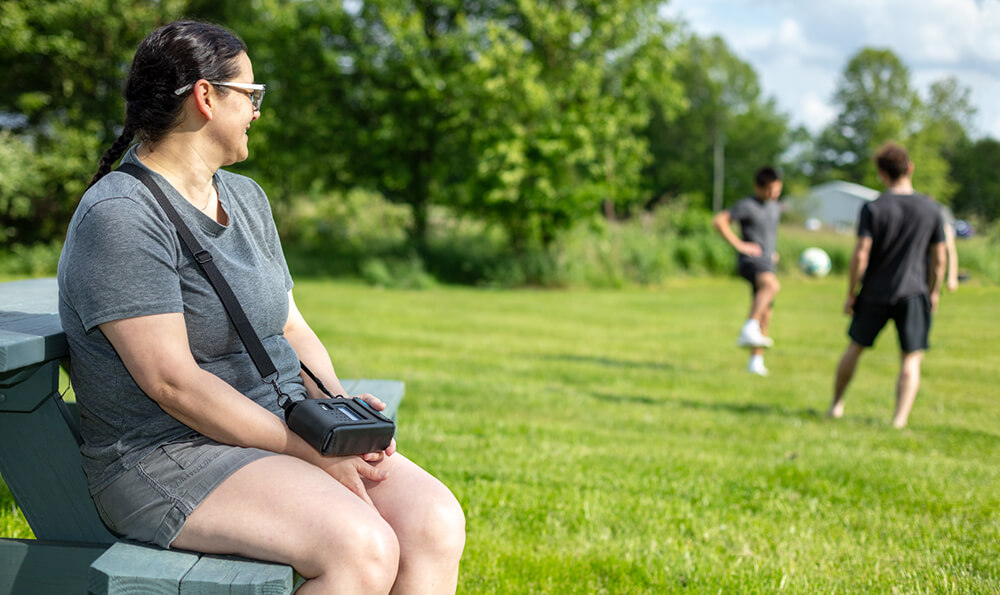 Tara Weese watches on as her kids play soccer